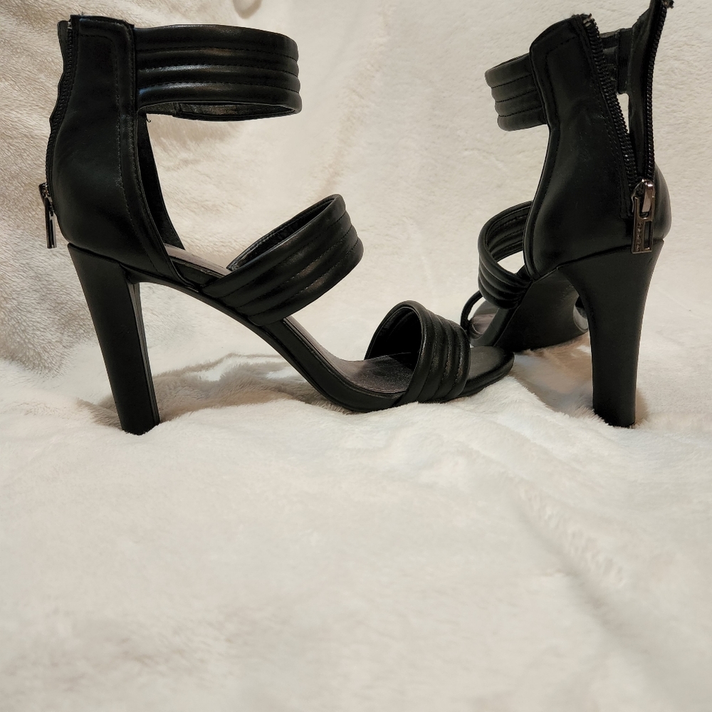 Calvin Klein, Black high-heeled sandal.